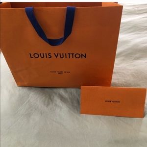 Authentic Louis Vuitton shopping bag